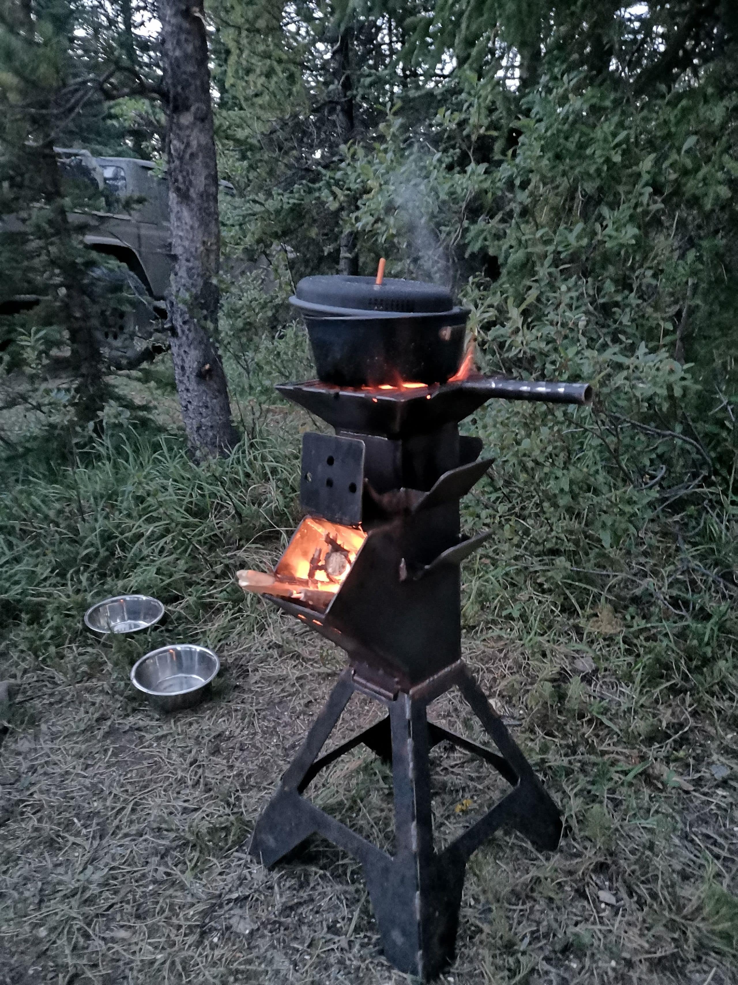 pot cooking on rocket stove
