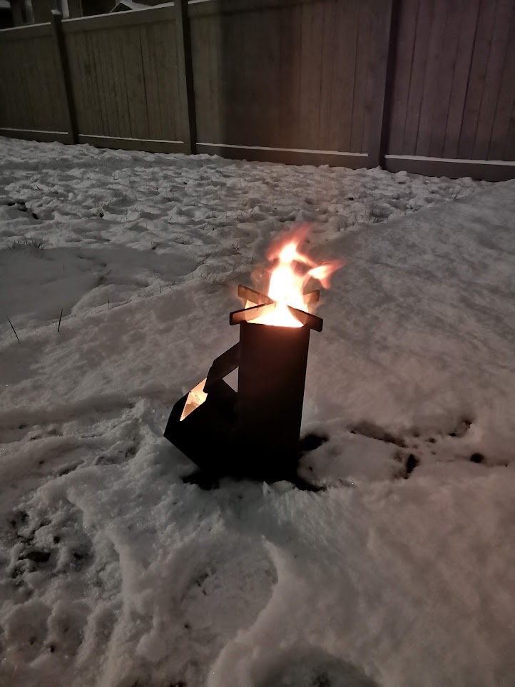 version 2 rocket stove with fire