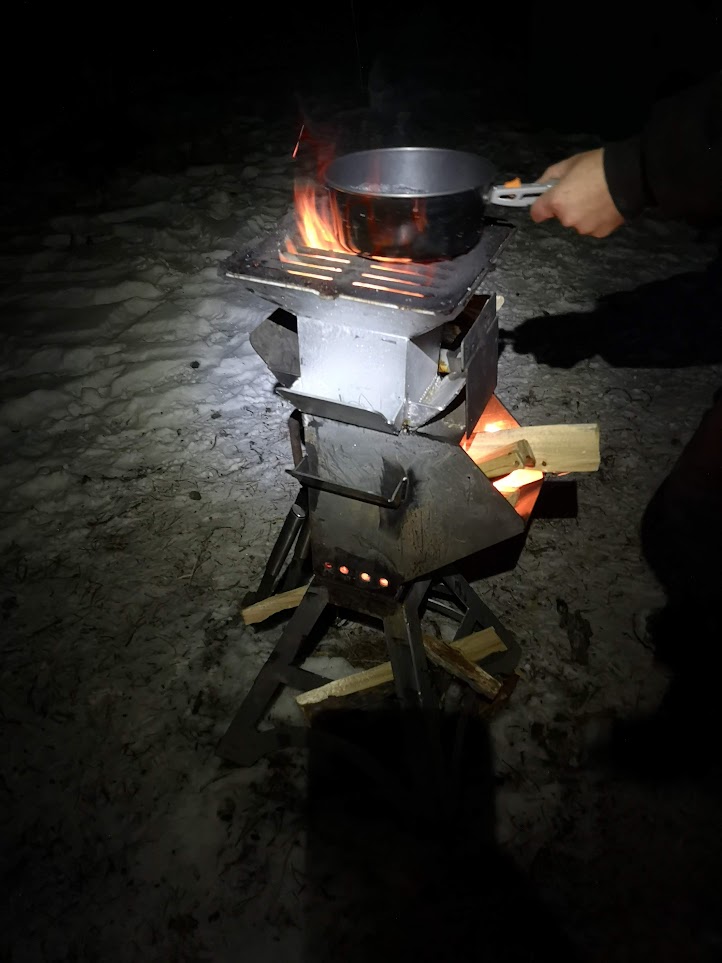 version 3 rocket stove with wood and cooking pot